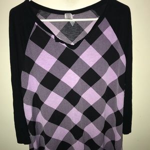 Women’s purple & black shirt.